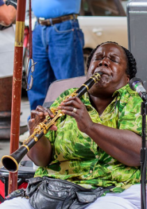 a woman playing the clarinet